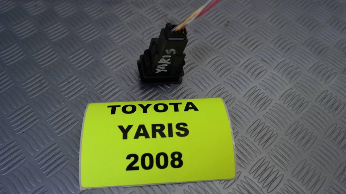 Toyota yaris pulsante regolaggio fari