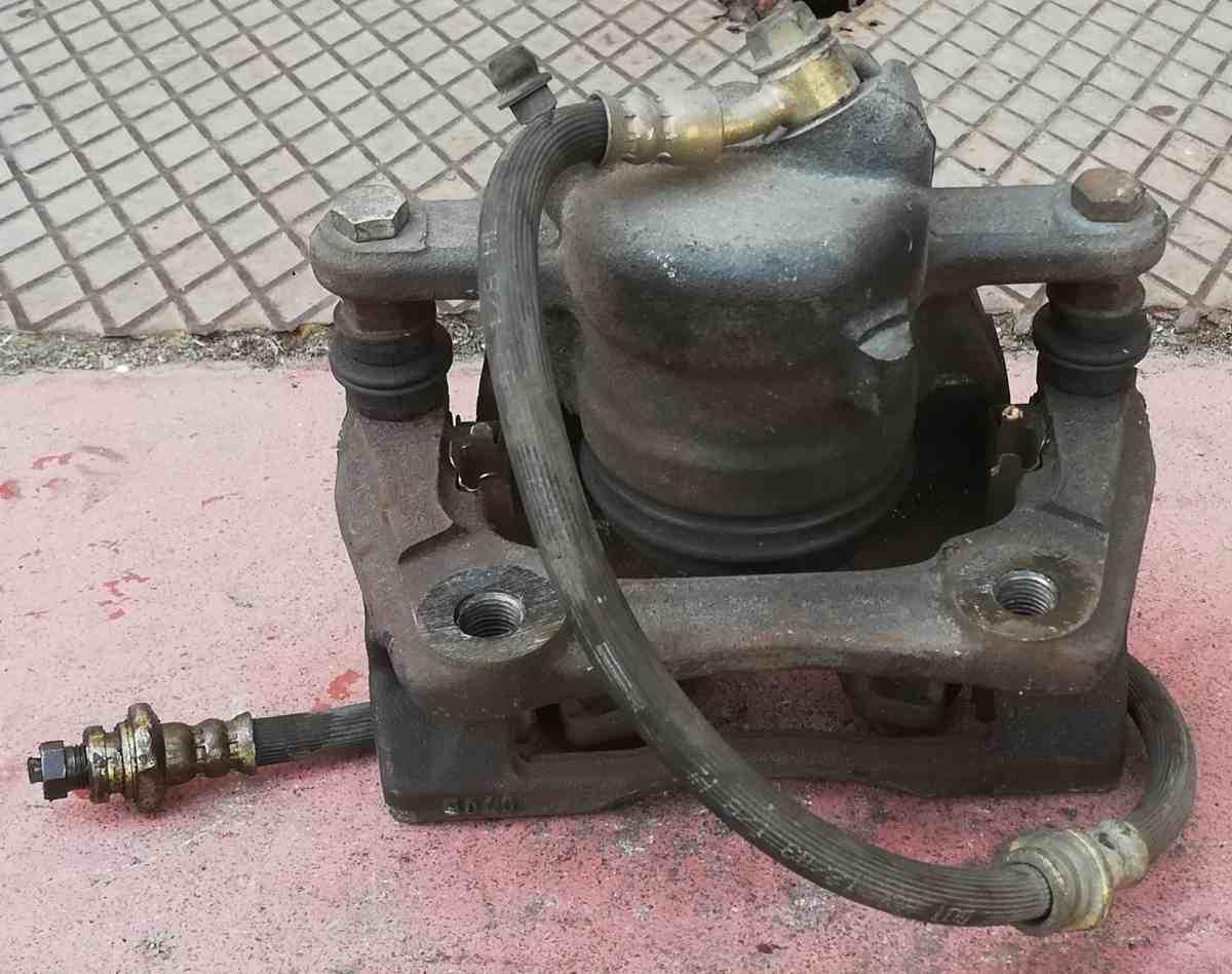 PINZA FRENO ANT SX NISSAN MICRA 1.5 DCI 41011AX60A<br /><br /><br />