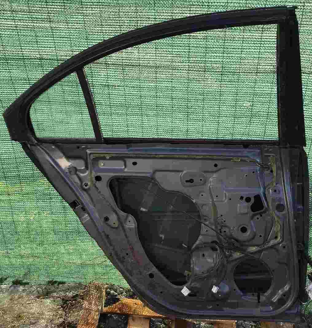 portiera posteriore sx nissan primera